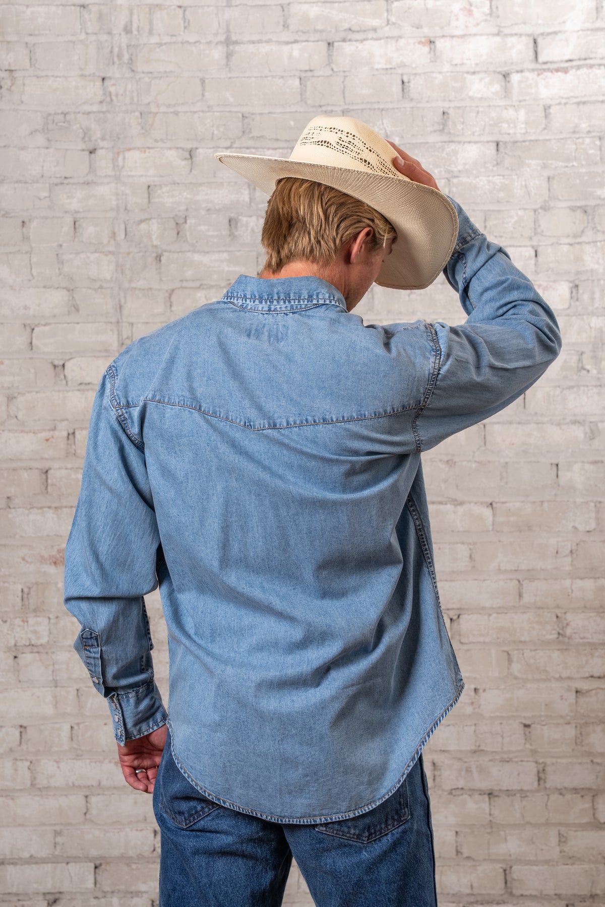 Men's Stonewashed Denim Classic Western Shirt by Rockmount Ranch Wear in vintage denim with round snap closure