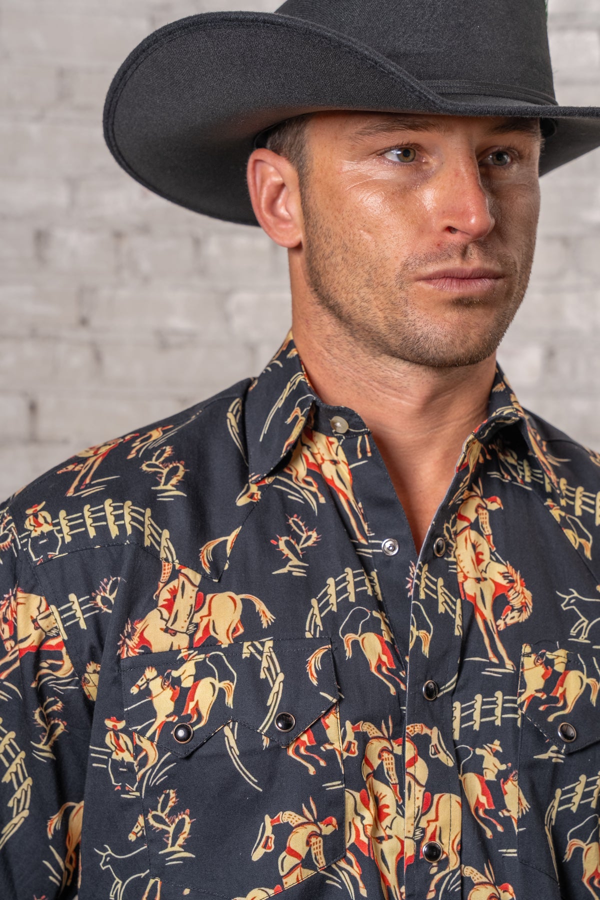 Men's Vintage Black Short Sleeve Bronc Print Western Shirt by Rockmount Ranch Wear with vintage western wear print