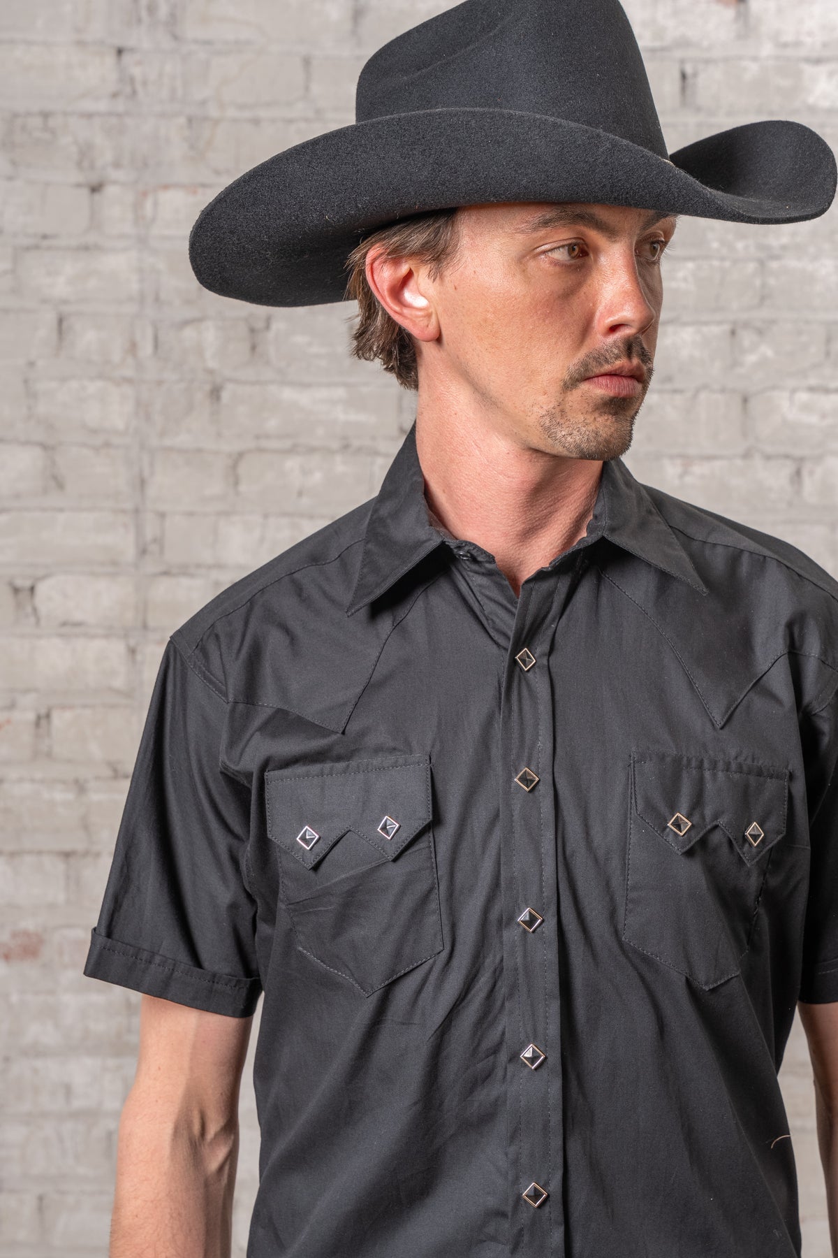 Men's Solid Black Cotton Blend Short Sleeve Western Shirt by Rockmount Ranch Wear with diamond snaps
