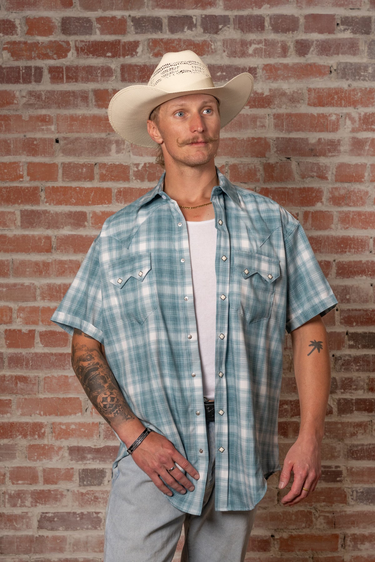 Men's Teal Short Sleeve Shadow Plaid Western Shirt by Rockmount Ranch Wear with sawtooth pocket and snaps