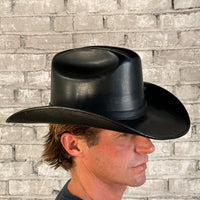 Full grain leather hat in Cattleman Black by Rockmount Ranch Wear with curved brim and stitched crown