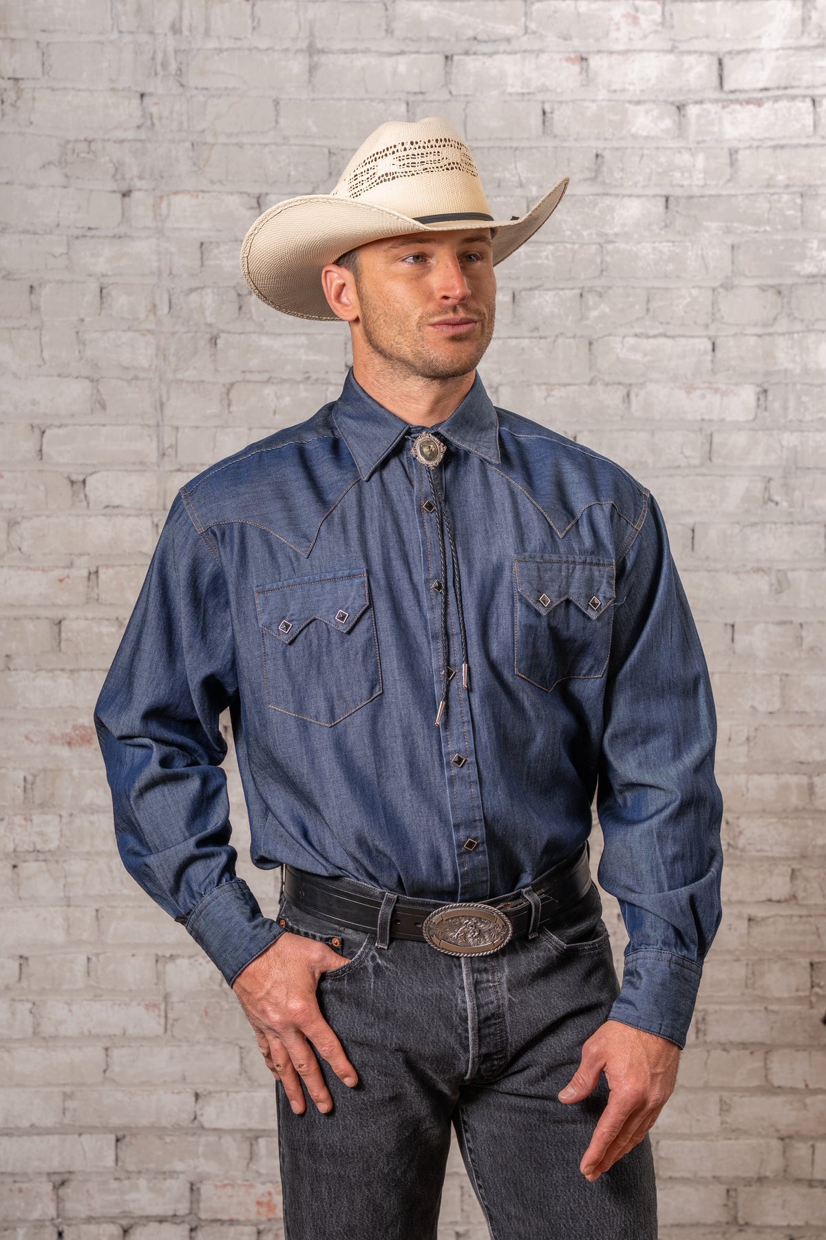 Men's Tencel Denim Sawtooth Western Shirt by Rockmount Ranch Wear in blue denim with diamond snaps