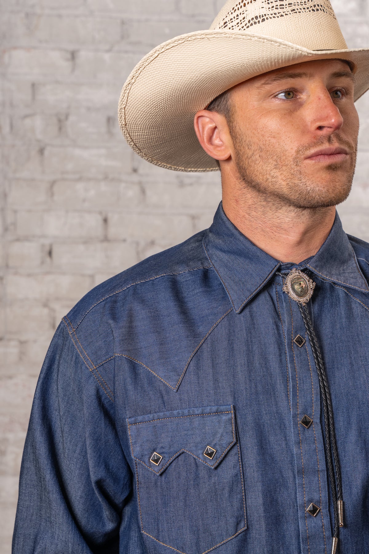 Men's Tencel Denim Sawtooth Western Shirt by Rockmount Ranch Wear in denim blue with sawtooth pockets and diamond snaps