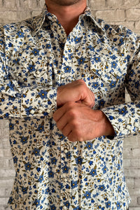 Rockmount Men's Ivory Floral Print Western Shirt with blue floral print, sawtooth pockets, and diamond snaps