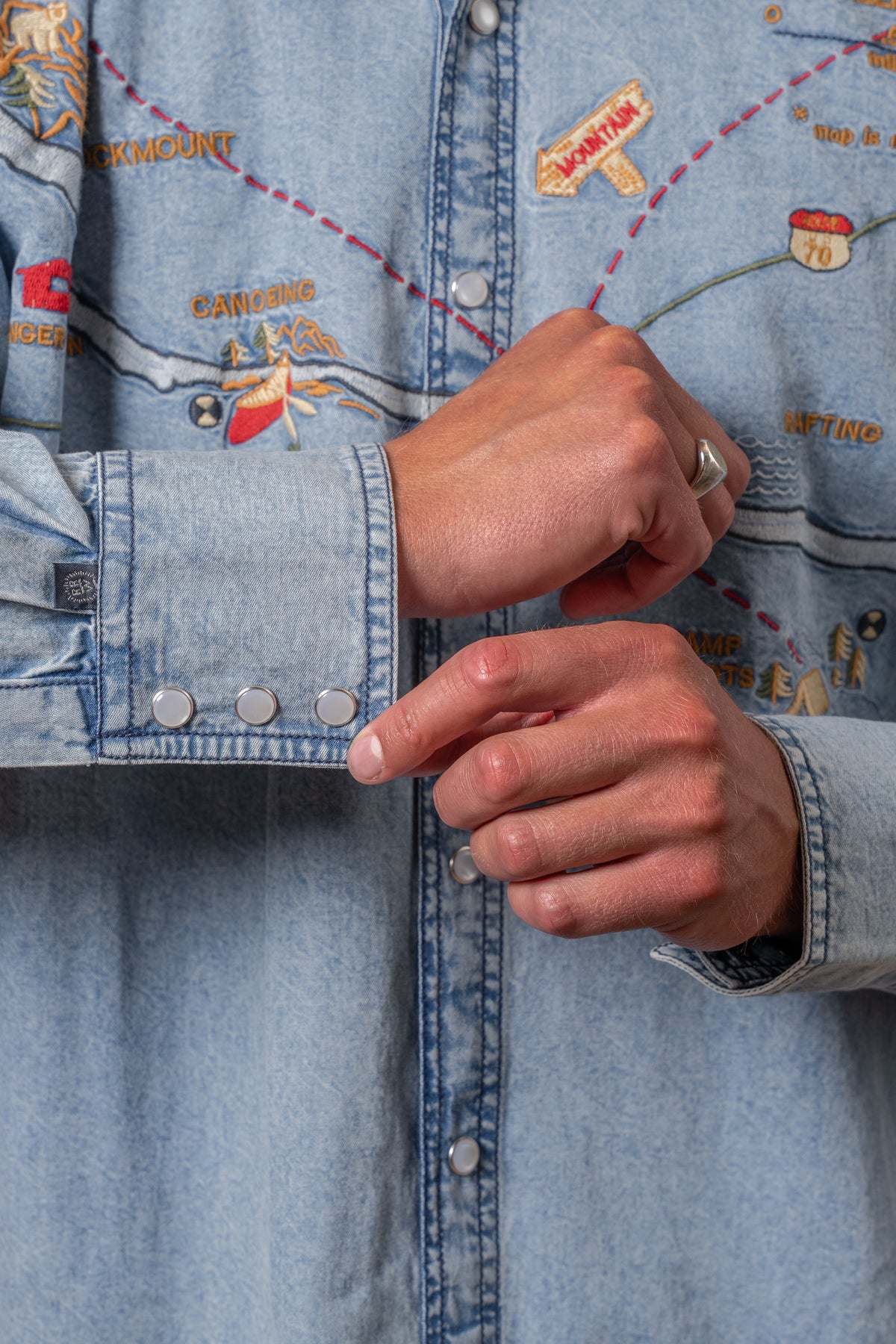 Men's Denim Embroidered Map Western Shirt by Rockmount Ranch Wear in vintage denim with embroidered western map motif
