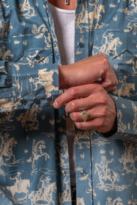 Men's Blue Print Western Shirt by Rockmount Ranch Wear in vintage blue with cowboy print and snaps
