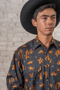 Men's Black Print Western Shirt by Rockmount Ranch Wear with cowboy print, sawtooth pocket and snaps