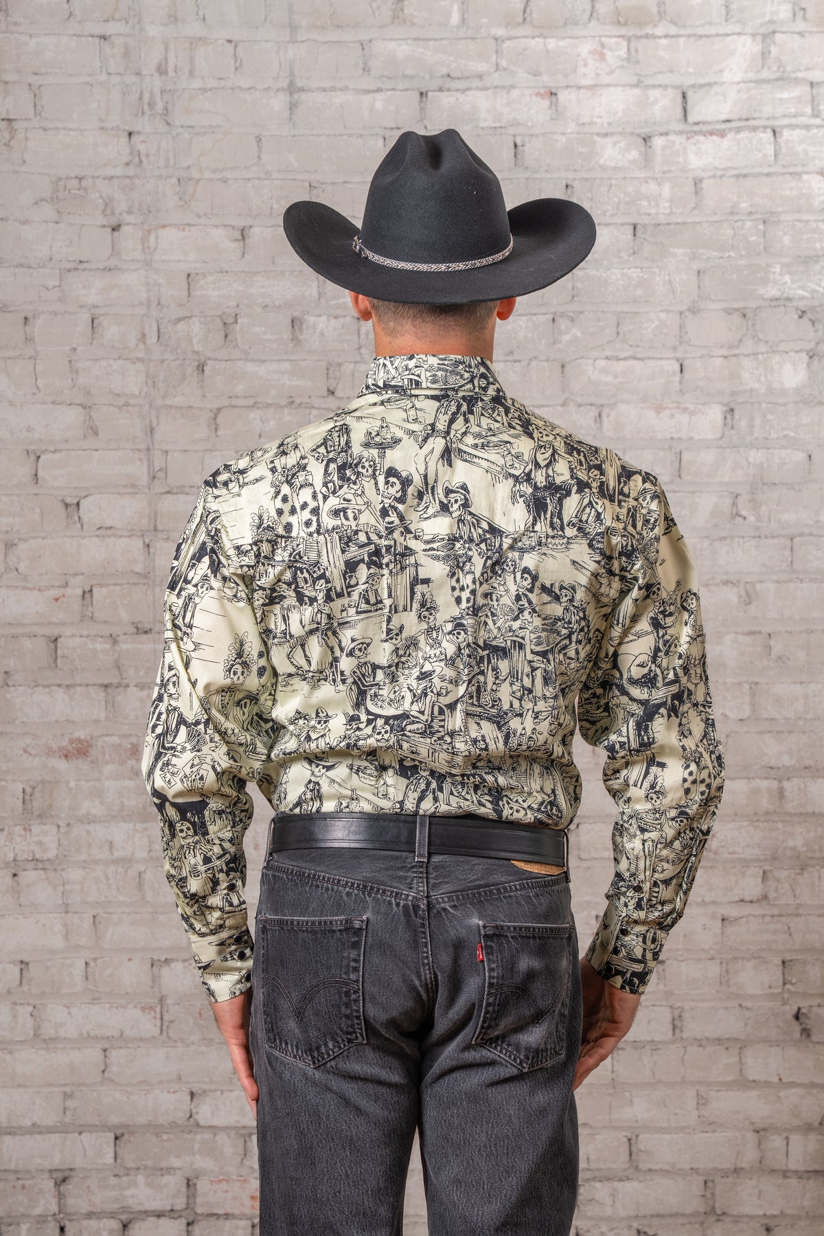 Men's Deadwood Saloon Print Western Shirt by Rockmount Ranch Wear in vintage cowboy print with snap closures