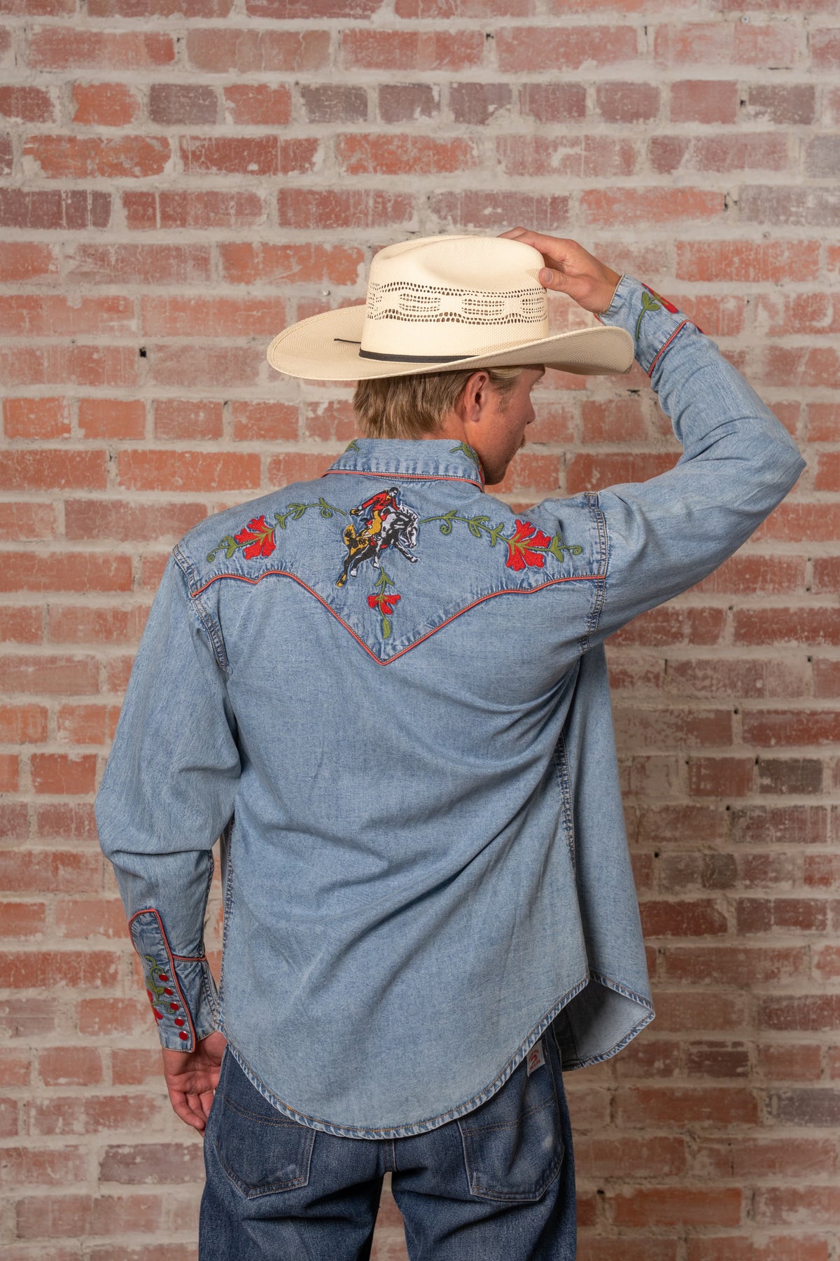 Men's Vintage Denim Bronc Embroidered Western Shirt by Rockmount Ranch Wear in stonewashed blue with embroidered arrows