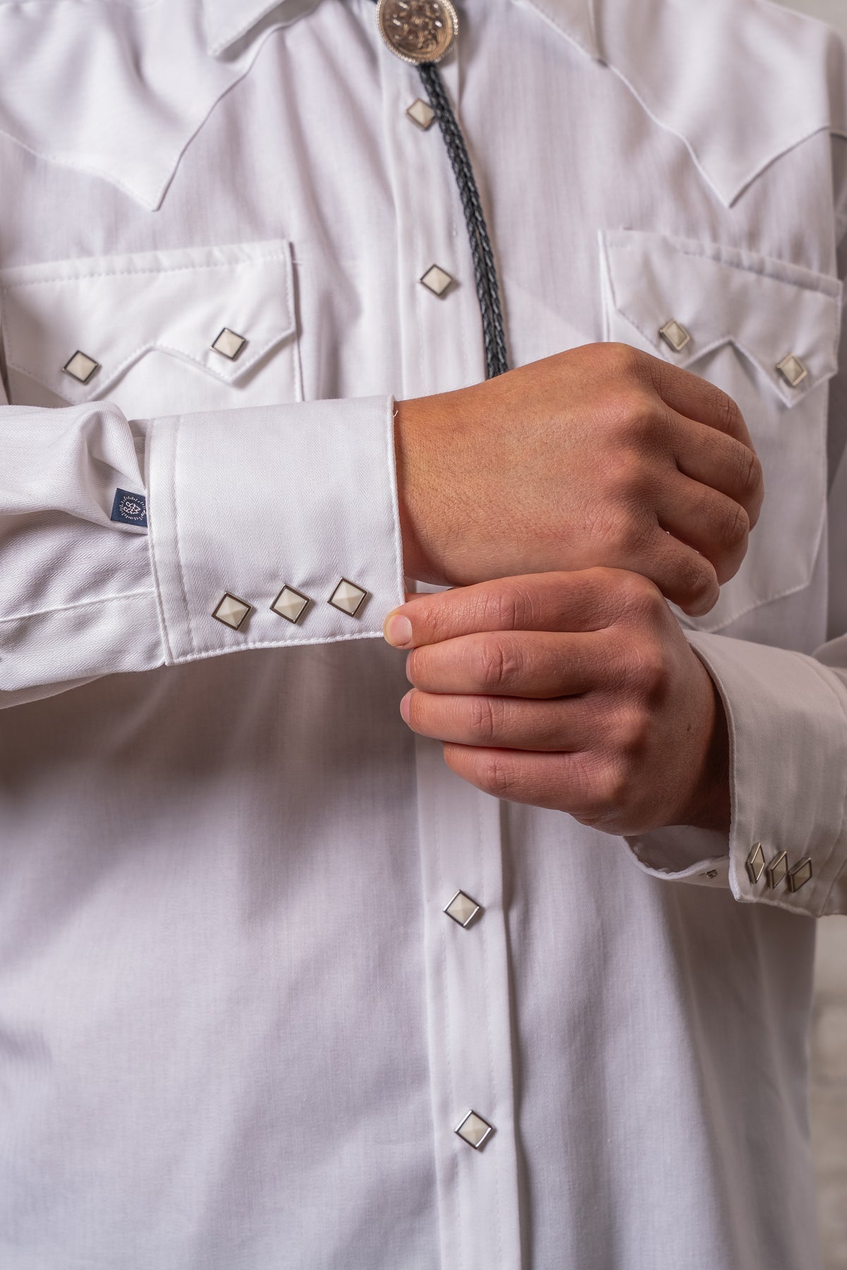 Men's White Pima Cotton Herringbone Western Shirt by Rockmount Ranch Wear with sawtooth pockets and diamond snaps