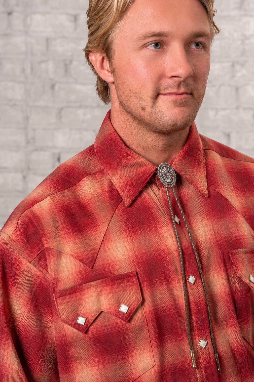 Men's Red Fine Shadow Plaid Western Shirt by Rockmount Ranch Wear in vintage plaid with sawtooth pockets and diamond snap design