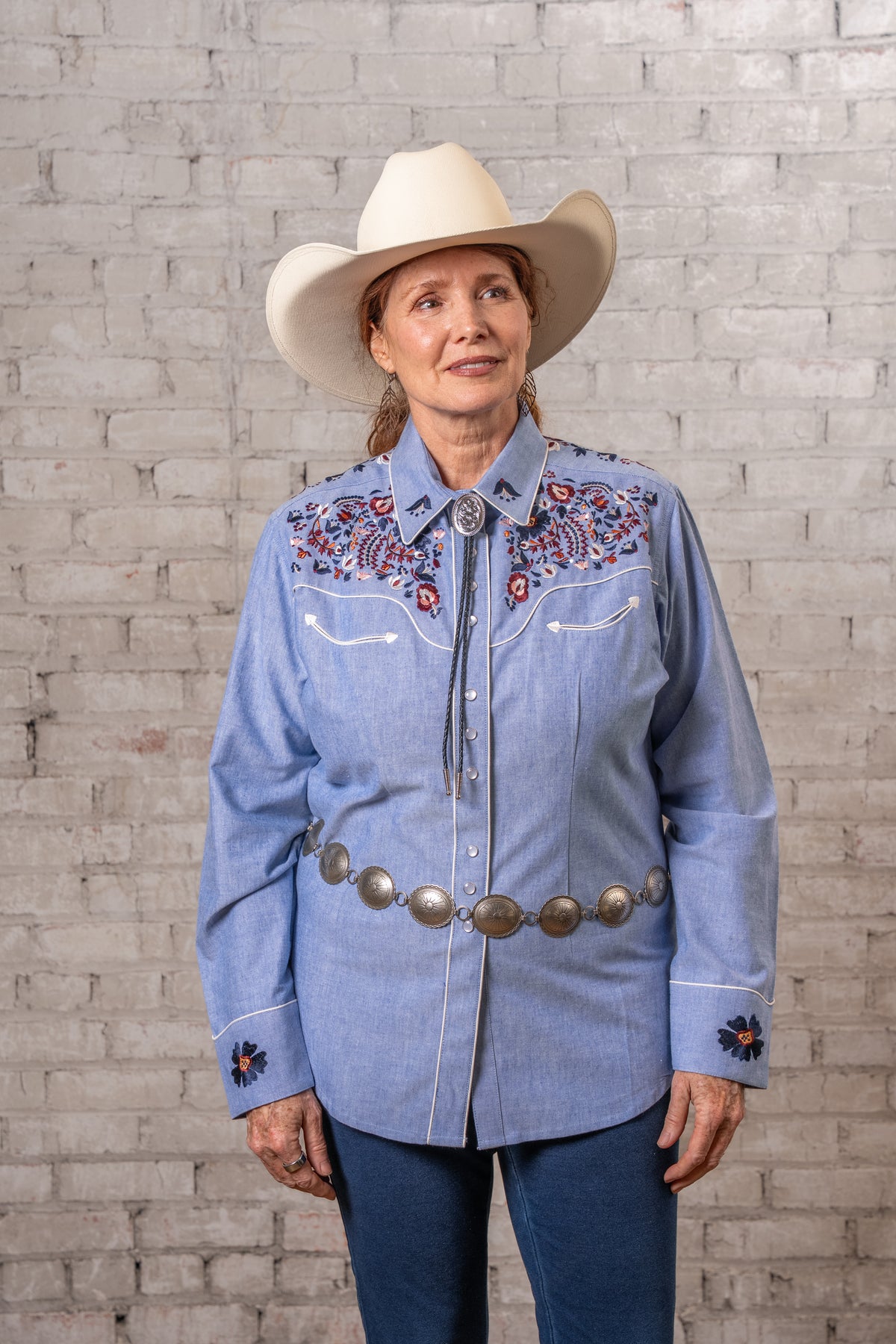 Women's Vintage Blue Floral Embroidered Western Shirt by Rockmount Ranch Wear in denim with ornate flower embroidery
