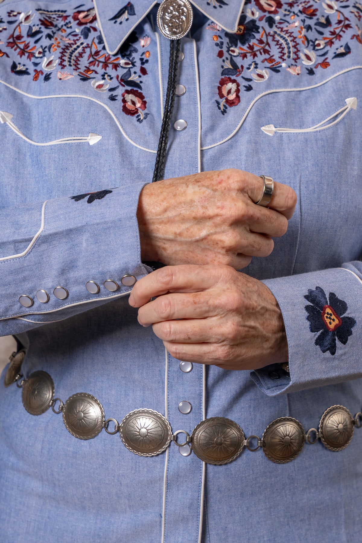 Women's Vintage Blue Floral Embroidered Western Shirt by Rockmount Ranch Wear in denim with ornate flower embroidery