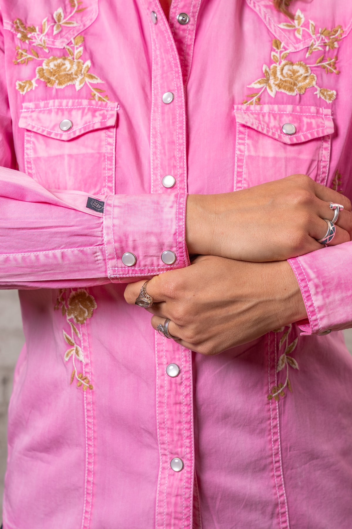 Women's Soft Pink Floral Embroidered Western Shirt by Rockmount Ranch Wear with snap button shirt details
