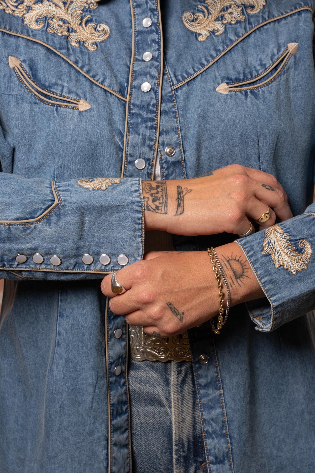 Women's Vintage Denim Western Shirt with Floral Embroidery by Rockmount Ranch Wear, pearl snap buttons