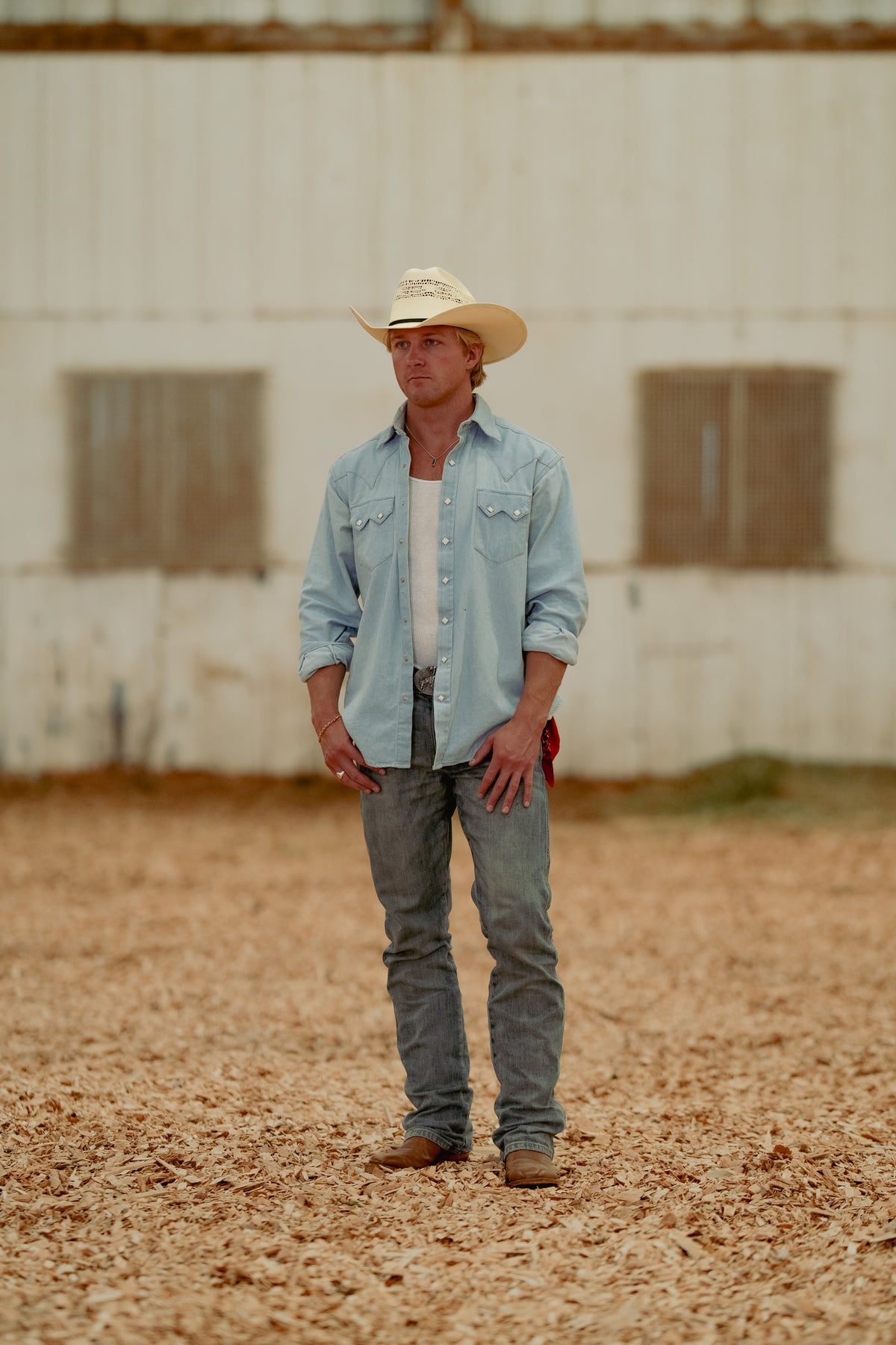 Men's Stonewashed Denim Sawtooth Western Shirt by Rockmount Ranch Wear in light blue denim with diamond snap closures