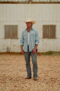 Men's Stonewashed Denim Sawtooth Western Shirt by Rockmount Ranch Wear in light blue denim with diamond snap closures