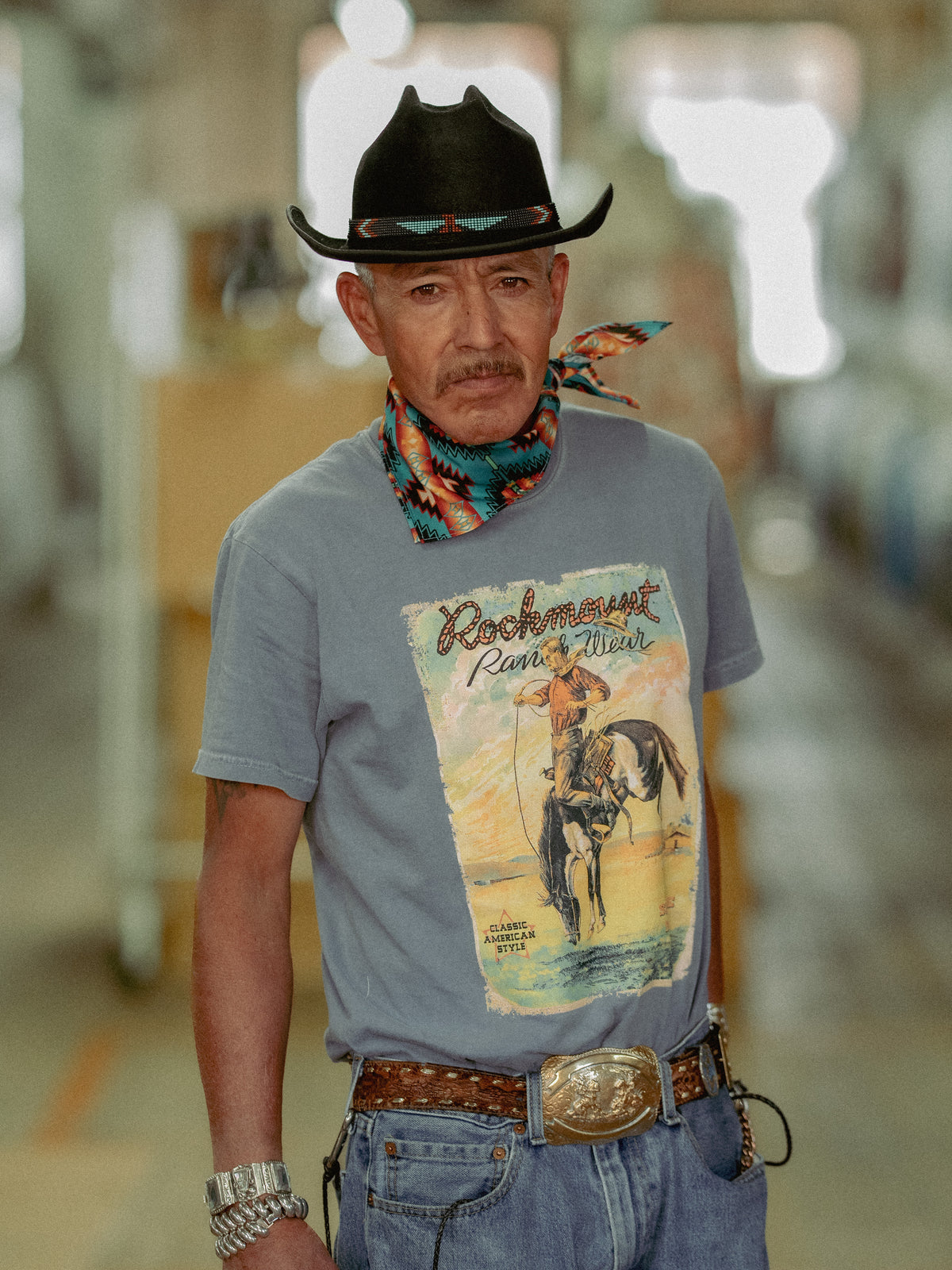 Men's Denim Vintage Bronc Western T-Shirt by Rockmount Ranch Wear in vintage denim with printed cowboy graphic