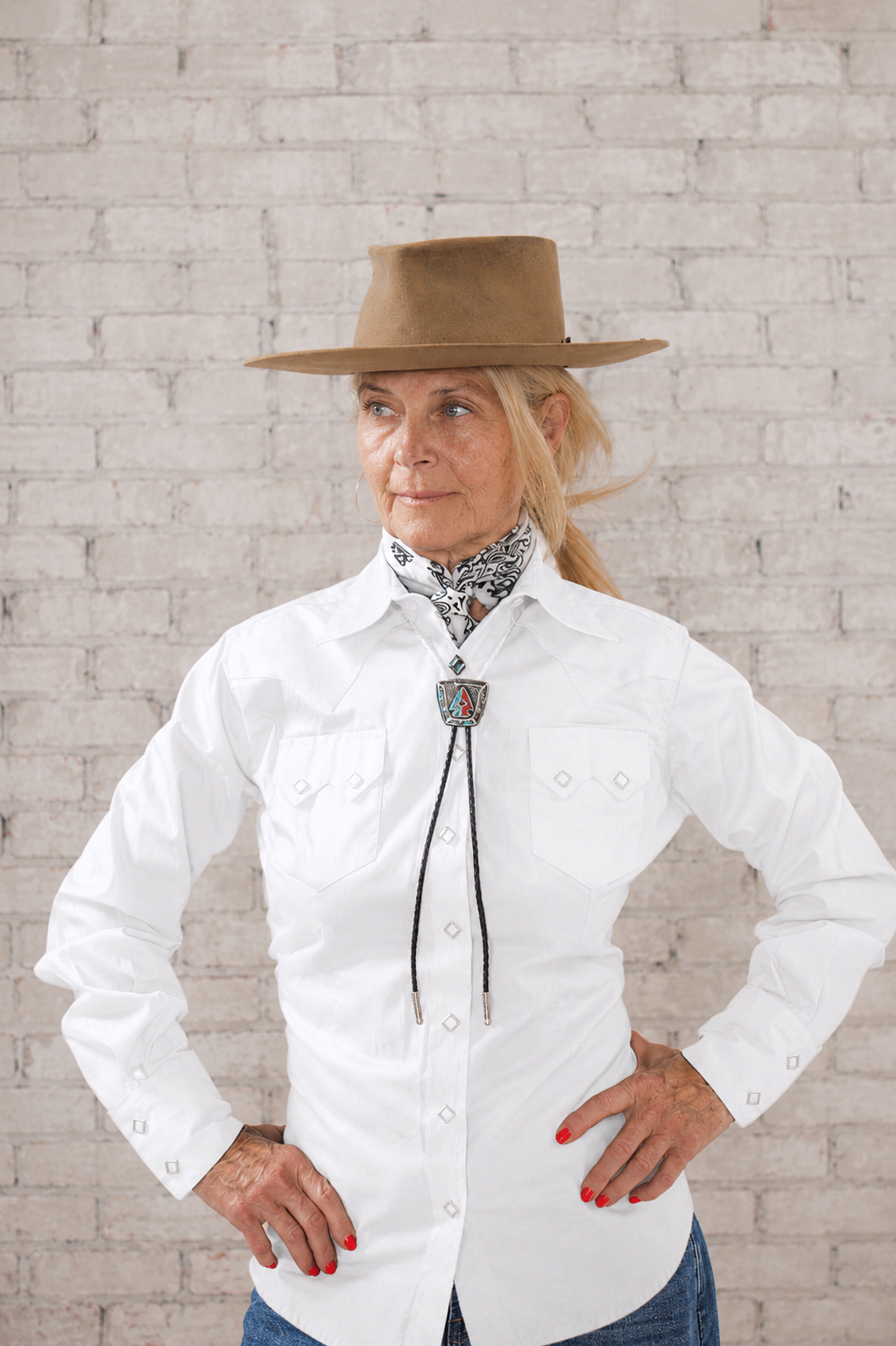 Women's Solid White Cotton Blend Western Shirt by Rockmount Ranch Wear with diamond snap closures and sawtooth pockets